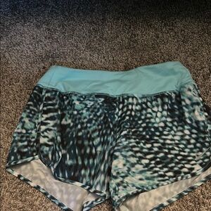 Nike Blue and Black Athletic Shorts with Dynamic Print
